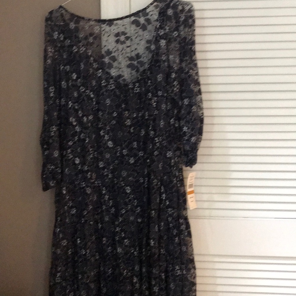 Women’s S.L Fashions blue floral lace dress.